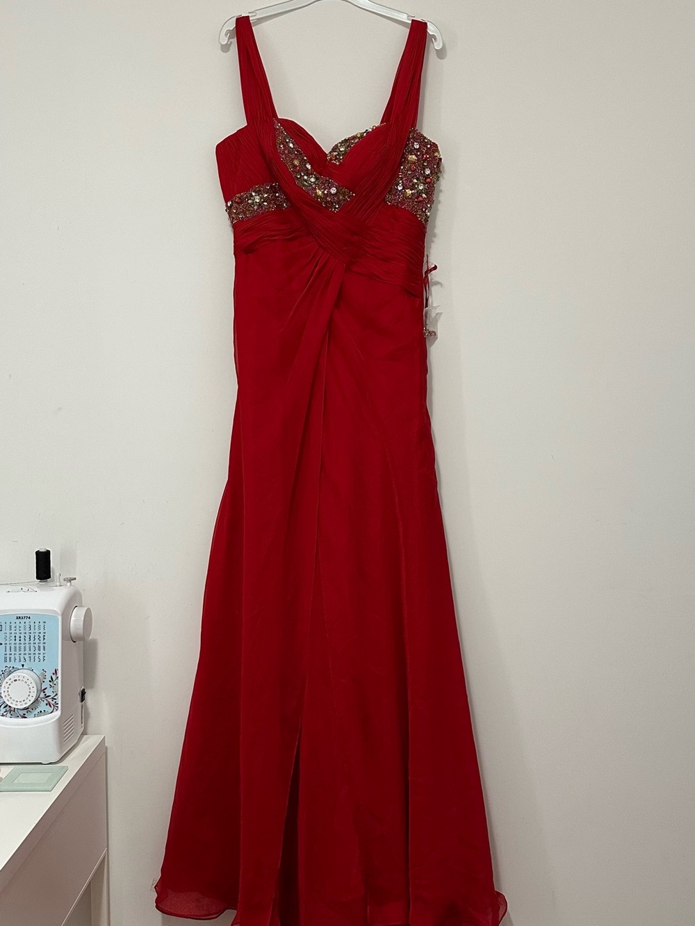 Elegant Red Evening Gown with Embellished Bodice